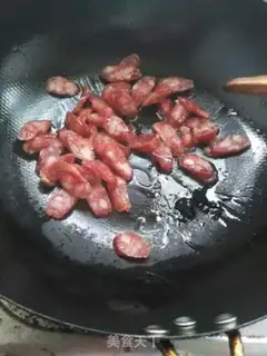 Make A cucumber fried sausage step 2