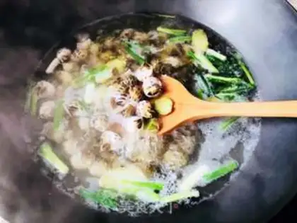 Make Salt water boiled flower snails step 3