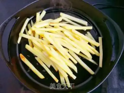 Make Spicy potato fries step 7