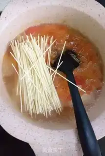Make Tomato cod noodles step 6
