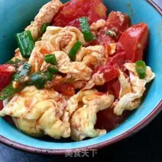 Make Tomato fried eggs step 9