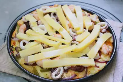 Make Seafood salami to the grand pizza step 13