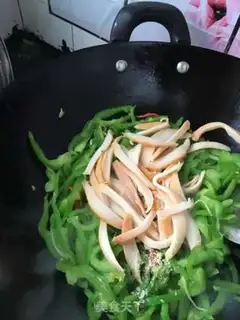 Make Green pepper fried gold abalone step 14