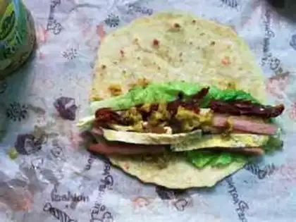 Make A sour cucumber-meal burrito step 12