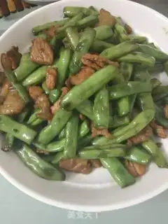 Make Four seasons of bean fried meat step 6