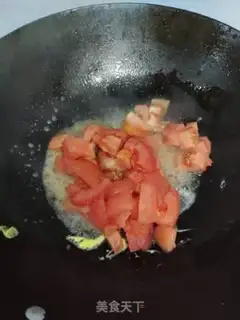 Make Tomato fried eggs step 3