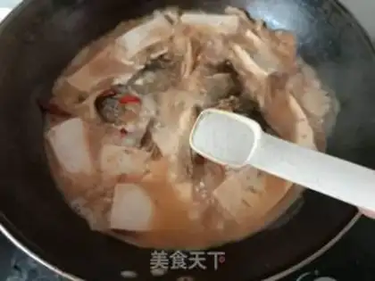 Make Tofu-cooked fish head step 11
