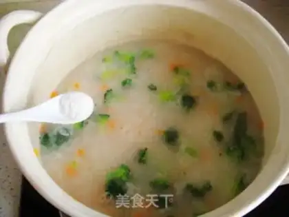 Make Vegetable shrimp congee step 5