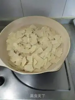 Make Dried tofu, fried peppers step 2