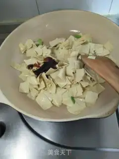 Make Dried tofu, fried peppers step 6