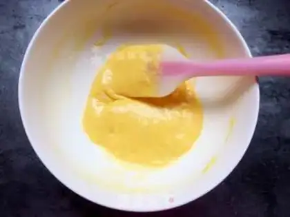 Make Halloween Ghost Face Cupcake step 7