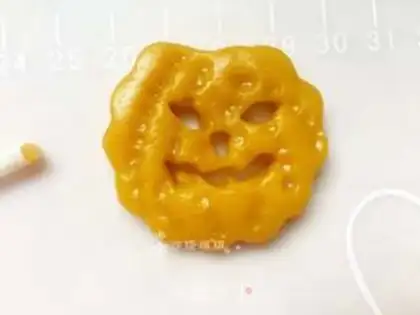 Make "Hallow Pumpkin Ghost Faces." step 10