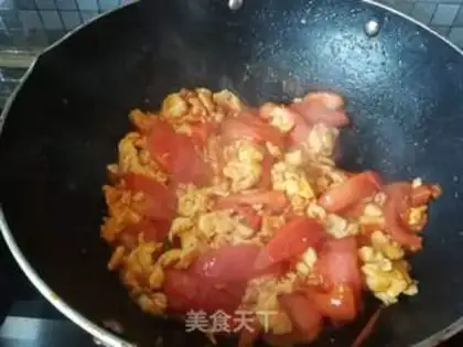 Make Tomato fried eggs step 9