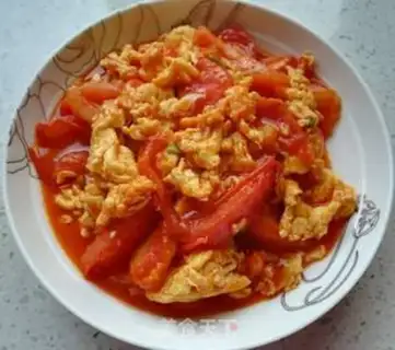 Make Tomato fried eggs step 10