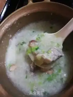 Make Wine and mushroom chicken congee step 4