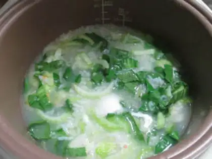 Make Two rice porridges for duck eggs step 3