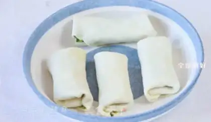 Make An egg roll with a pickle step 9