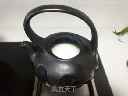Make A pot of pottery boils milk step 2