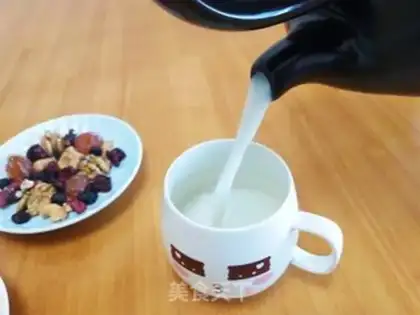 Make A pot of pottery boils milk step 4