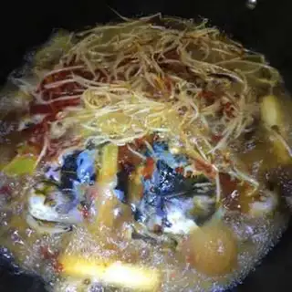 Make Home cooking fish step 11