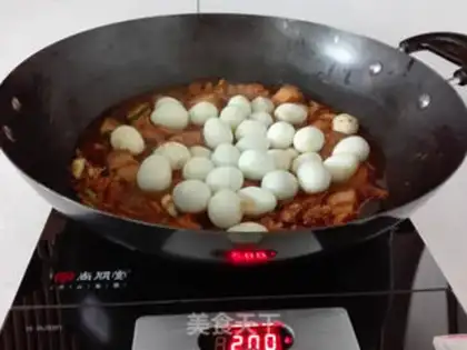 Make Quail egg red pork step 8