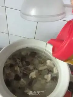 Make Chicken leg mushroom congee step 4