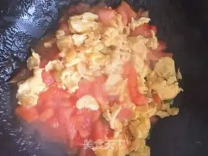 Make Tomato fried eggs step 7