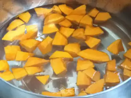 Make Pumpkin double-meat goose porridge step 7