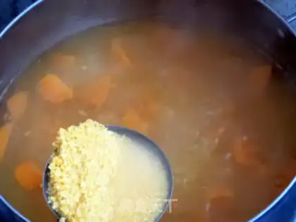Make Pumpkin double-meat goose porridge step 11