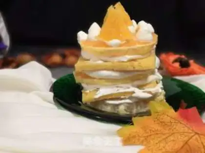 Make Orange Cake Tower step 10
