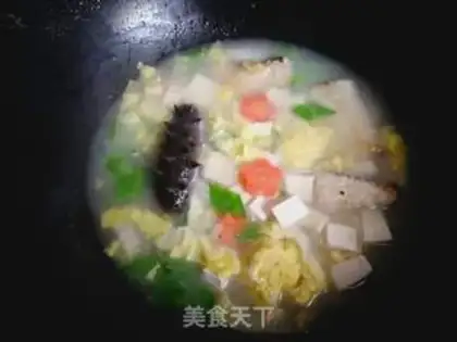 Make A tofu soup for fish bones step 8
