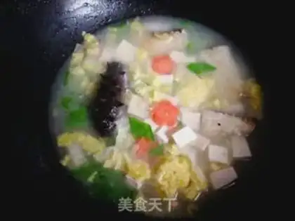 Make A tofu soup for fish bones step 9