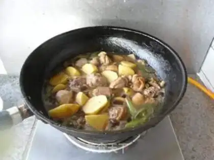 Make Curry potato chicken step 9
