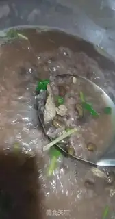 Make Black bean boar congee step 4