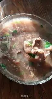 Make Black bean boar congee step 6