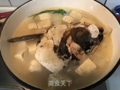 Make Frozen tofu fish head soup step 4