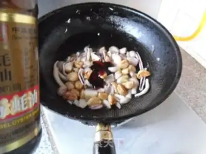 Make Onions of garlic burning squid step 7