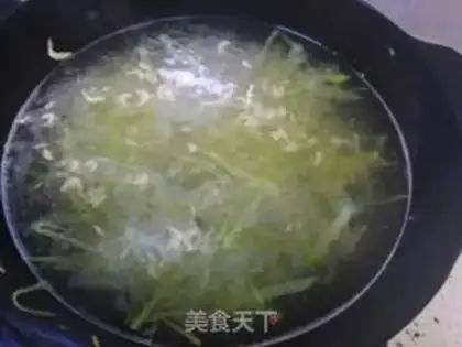 Make Carrot fan egg soup step 6