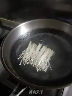 Make Soybeans with golden needle mushrooms step 6