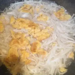 Make Eggs and golden mushrooms step 4