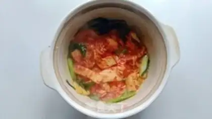 Make Korean pickle seafood soup step 5