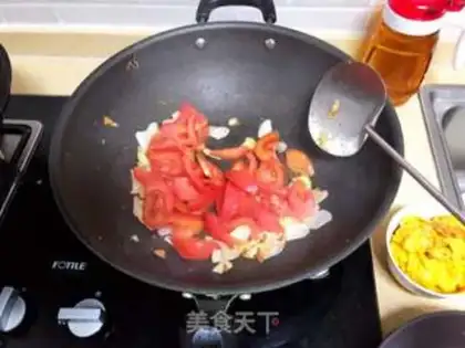 Make Tomato fried eggs step 16