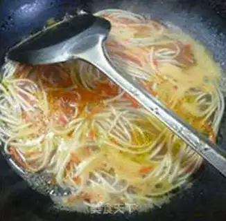 Make Fried eggs, carrots, noodles step 7