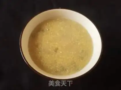 Make Corn dung green bean congee step 4