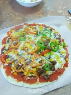 Make A pan of beef pizza step 11