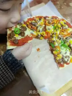 Make A pan of beef pizza step 12