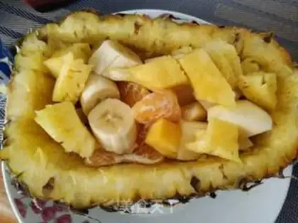 Make pineapple boat fruit salad step 9
