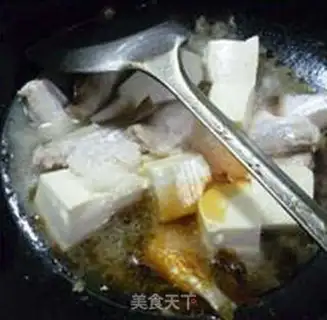 Make Rubber fish boil tofu step 6