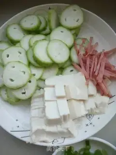 Make Seafood melon tofu soup step 4