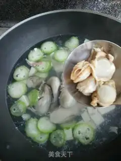 Make Seafood melon tofu soup step 9
